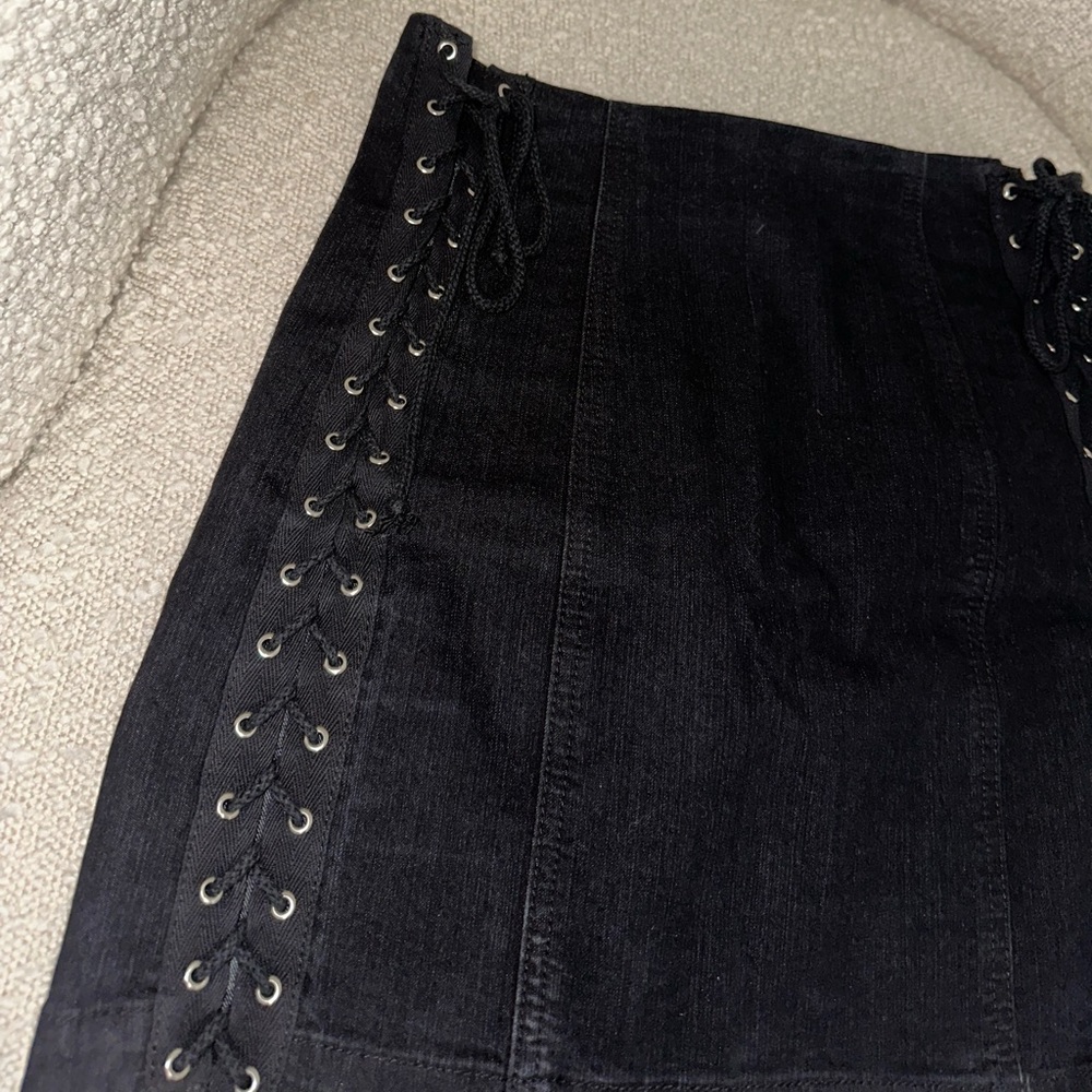 Black denim mini skirt